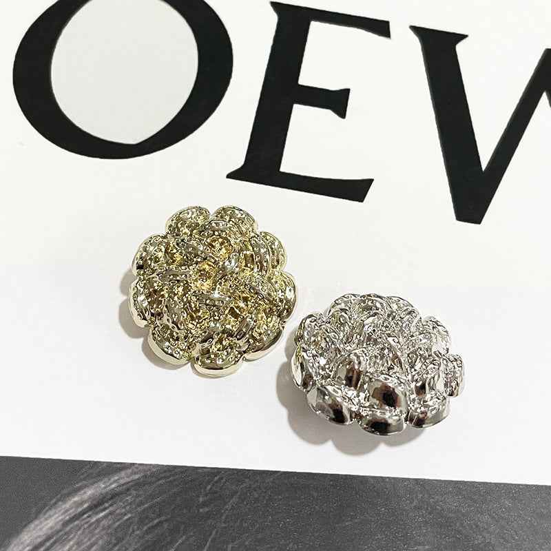 Spiral flower metal shank buttons in gold and silver, two-piece arrangement