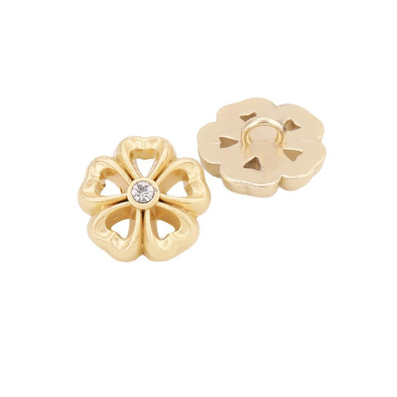 Sunflower rhinestone shank button, light gold metal with clear center gem