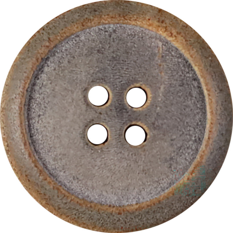 Matte buffalo horn button, burnt edge, four-hole design