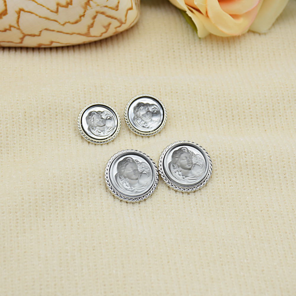Clear silver lady portrait resin buttons with silver rims; 4 round buttons, textured edge detail.