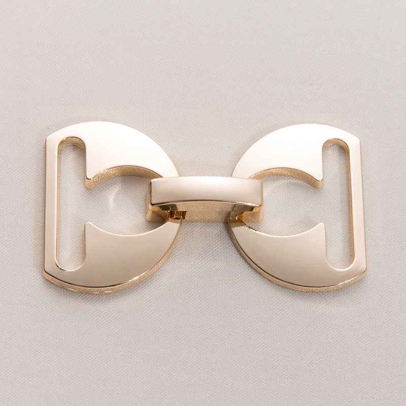 Gold detachable metal belt buckle clasp with curved U-frame and central snap bar