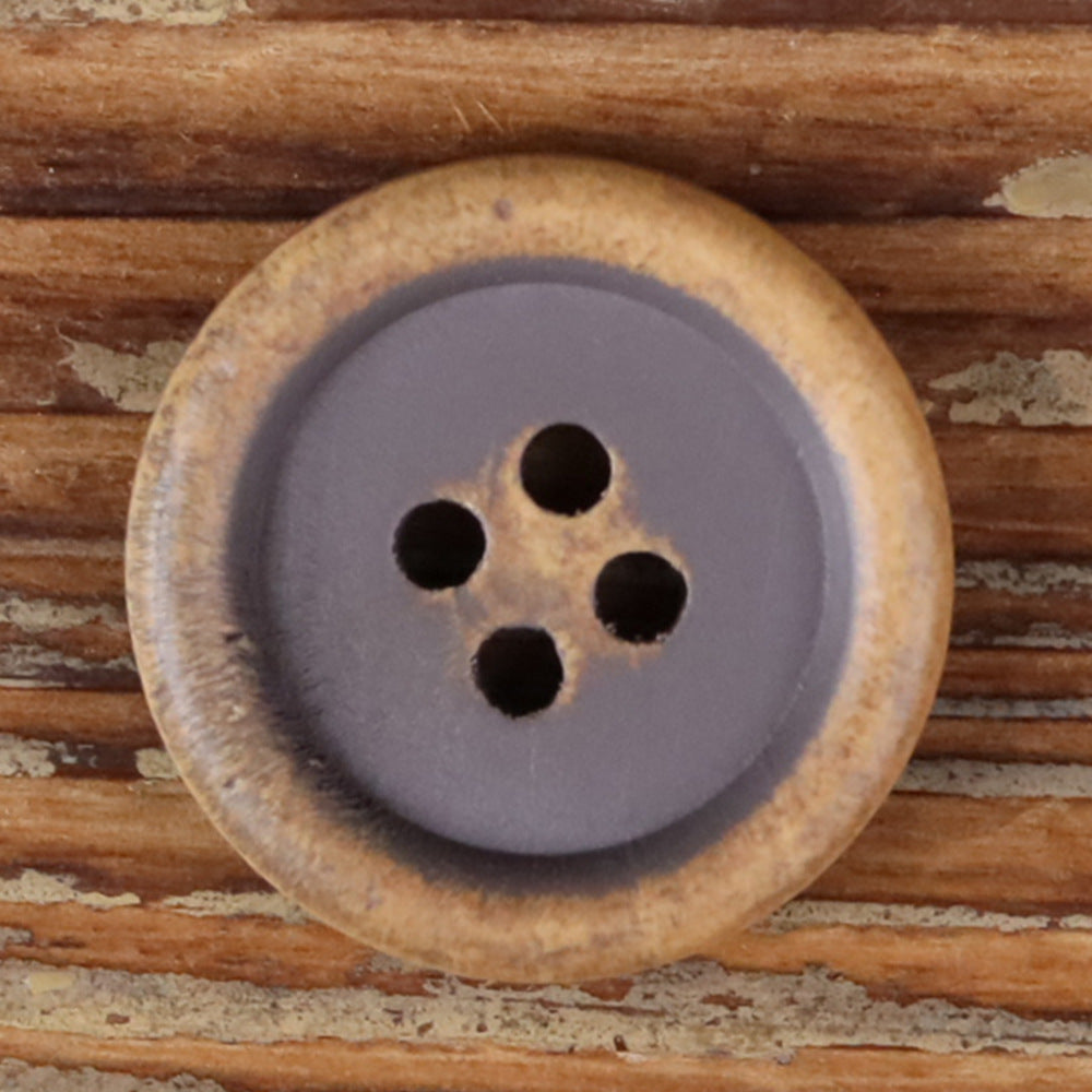 Round 4-hole wood button with dark gray face and tan wood rim