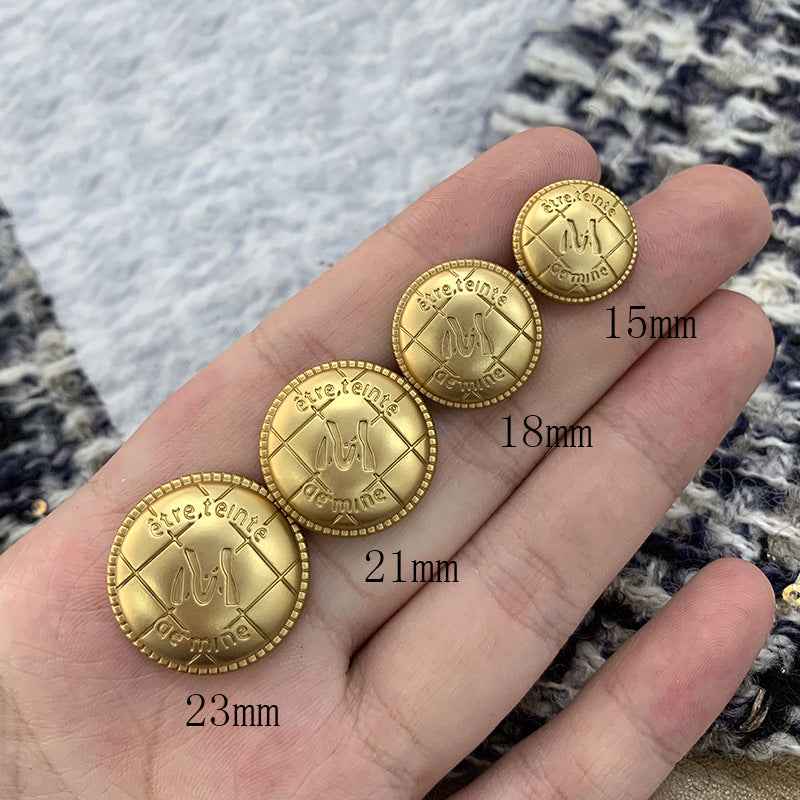 Gold round M-letter metal buttons, sizes 15mm/18mm/21mm/23mm shown