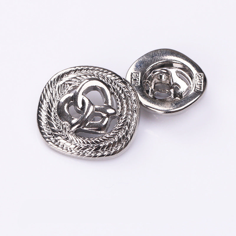 Gold rope-edge hollow heart metal shank button, front view
