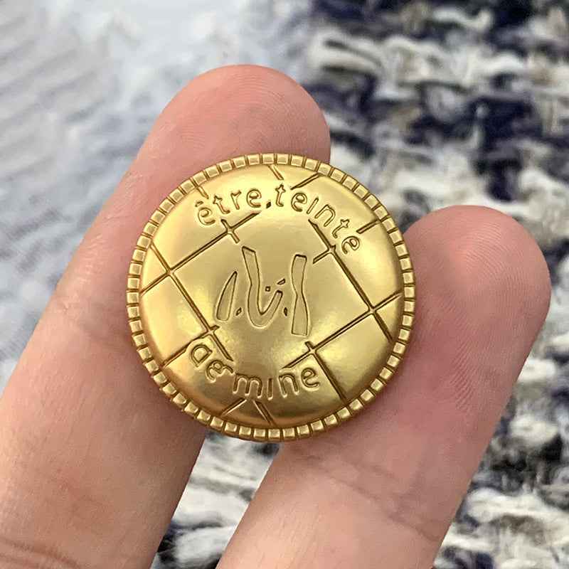 Gold round metal M-letter button, engraved center, beaded edge