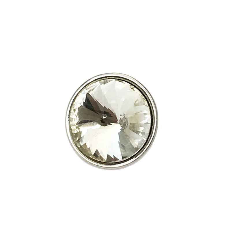 Close-up round silver metal button with clear cone rhinestone
