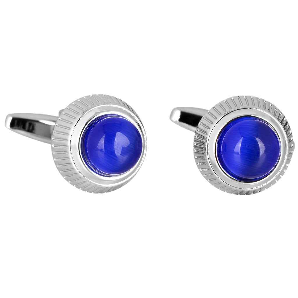 Round blue cat’s eye cufflinks with ridged silver bezel and hinged backs