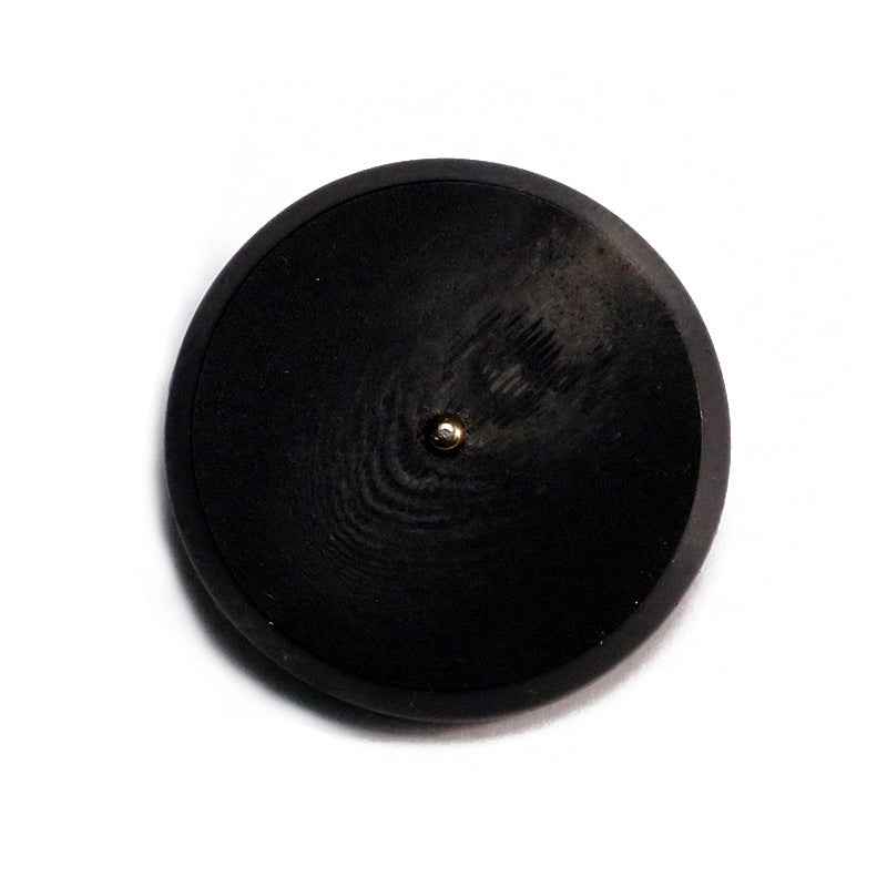Khaki round resin button with flat face and metal shank, visible button post