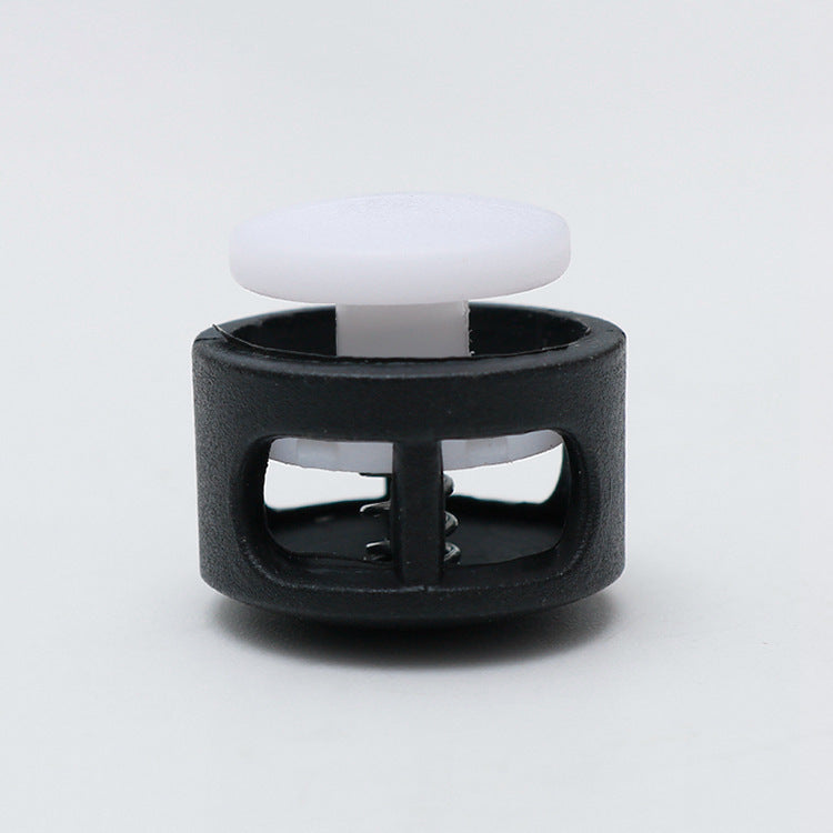 White top 17mm plastic cord lock toggle with spring, black housing