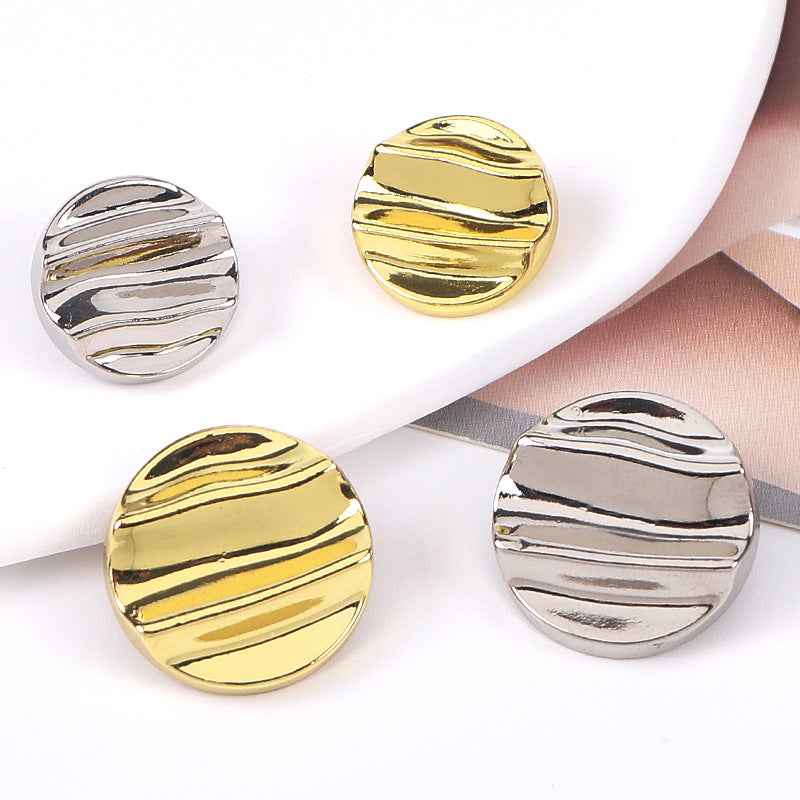 Gold crinkle wave metal shank buttons, front view