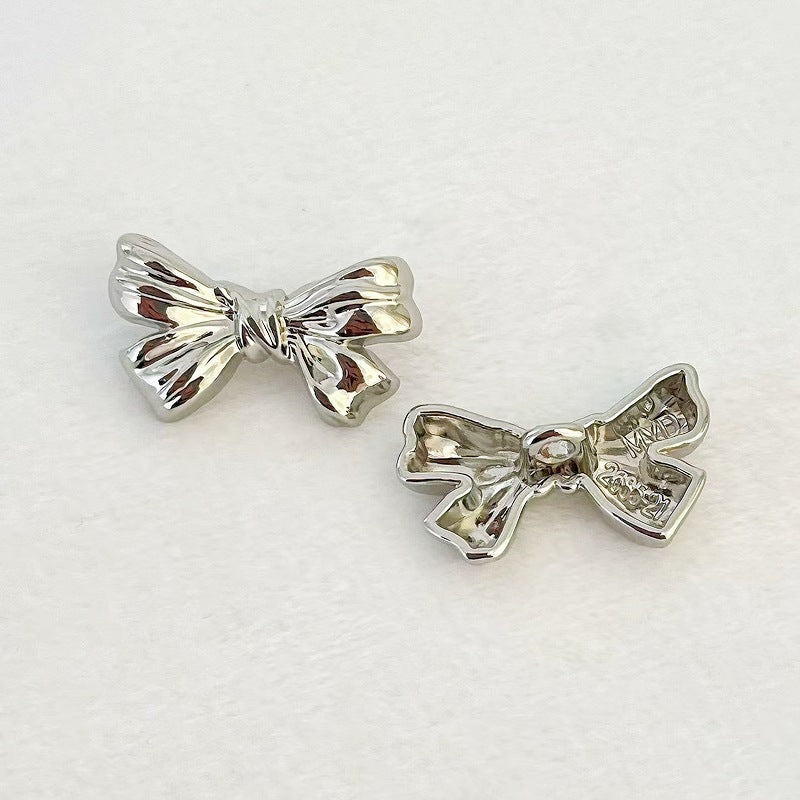 Nickel bowknot metal shank buttons, hand-sew; two silver-toned bow buttons