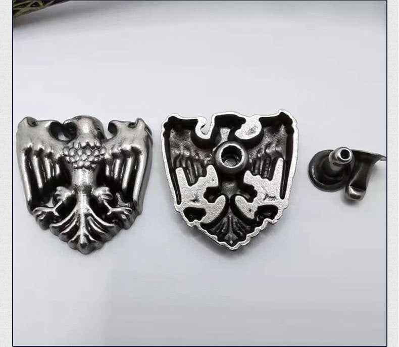 Gothic eagle-head metal rivet studs with skull wings, silver finish, 4 pieces shown