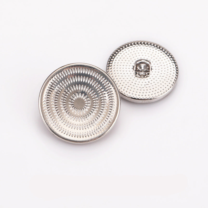 Silver and light gold spiral concave metal shank buttons with textured circular patterns