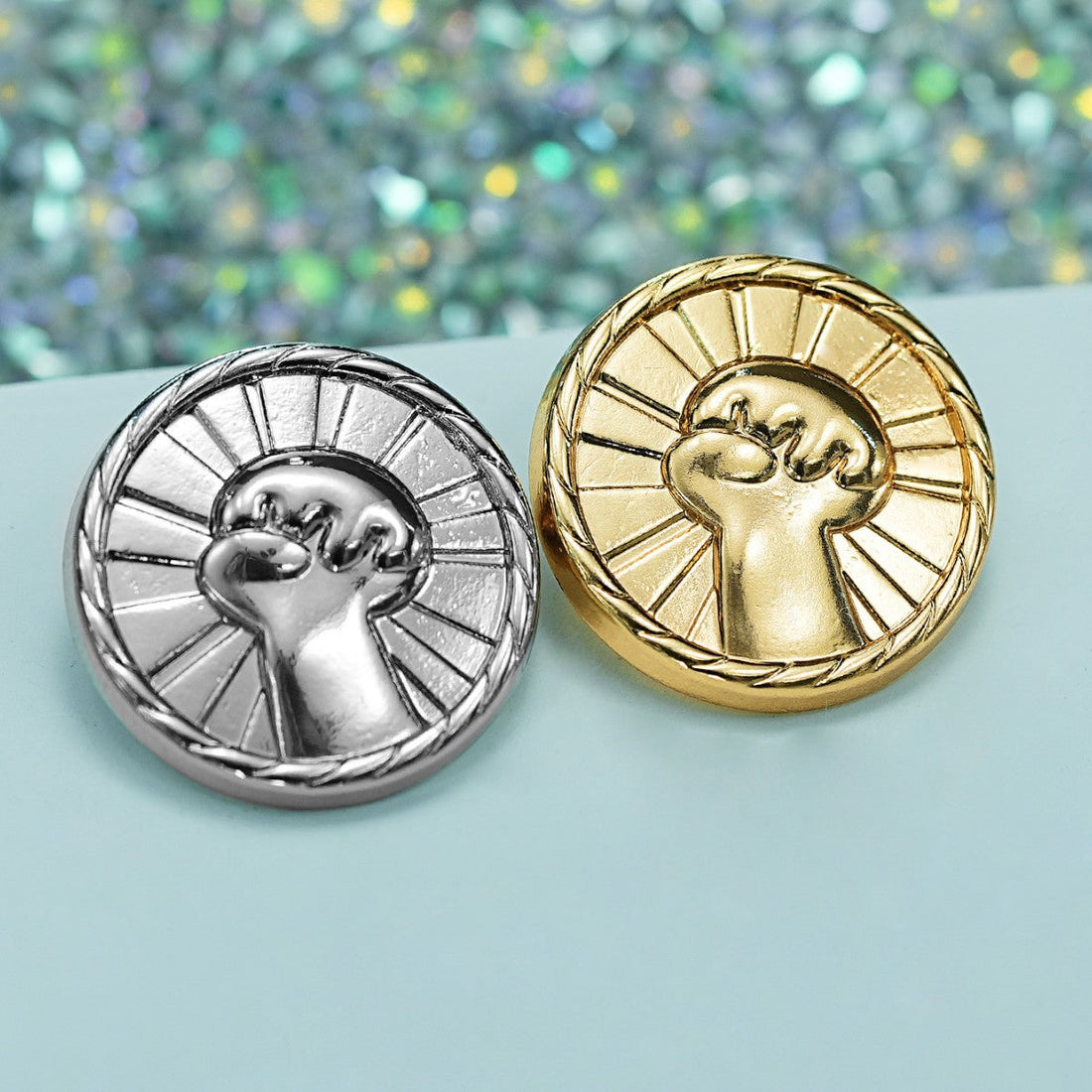 Round zinc alloy fist buttons, gold and silver, raised design with metal shank