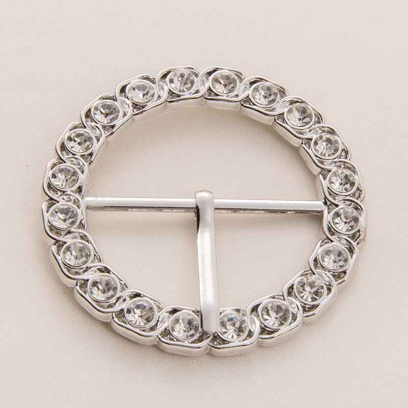 Silberne runde Gürtelschnalle mit Strass, Stegverschluss und mittlerer Stift