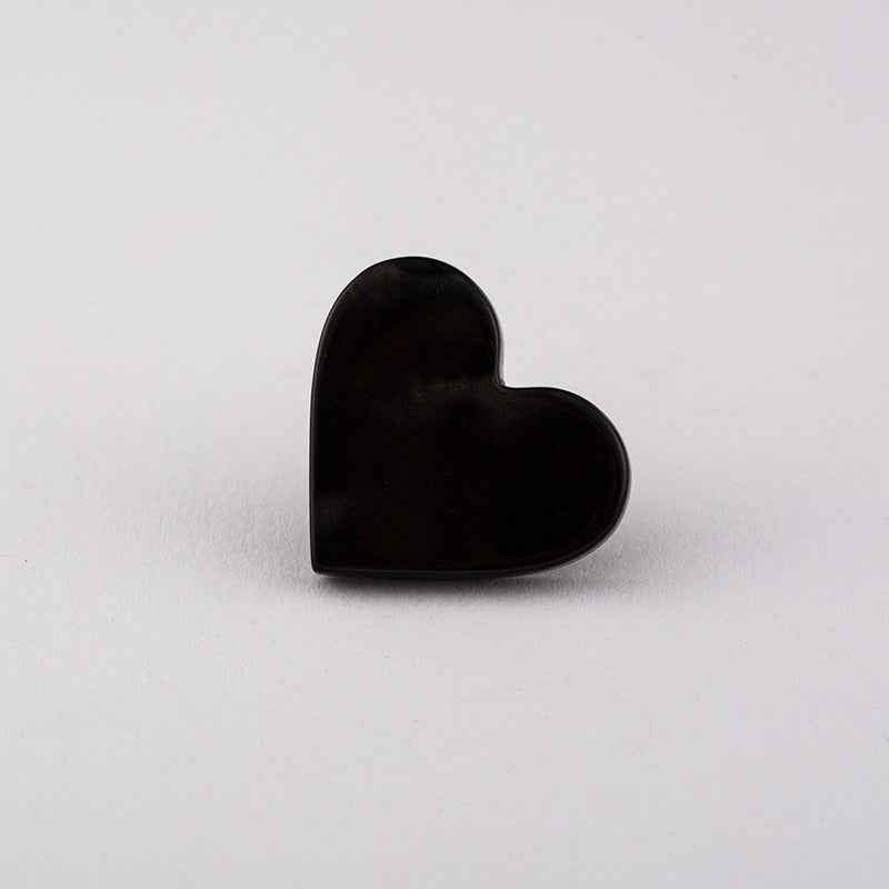 Dark black flat heart button with metal shank, glossy front