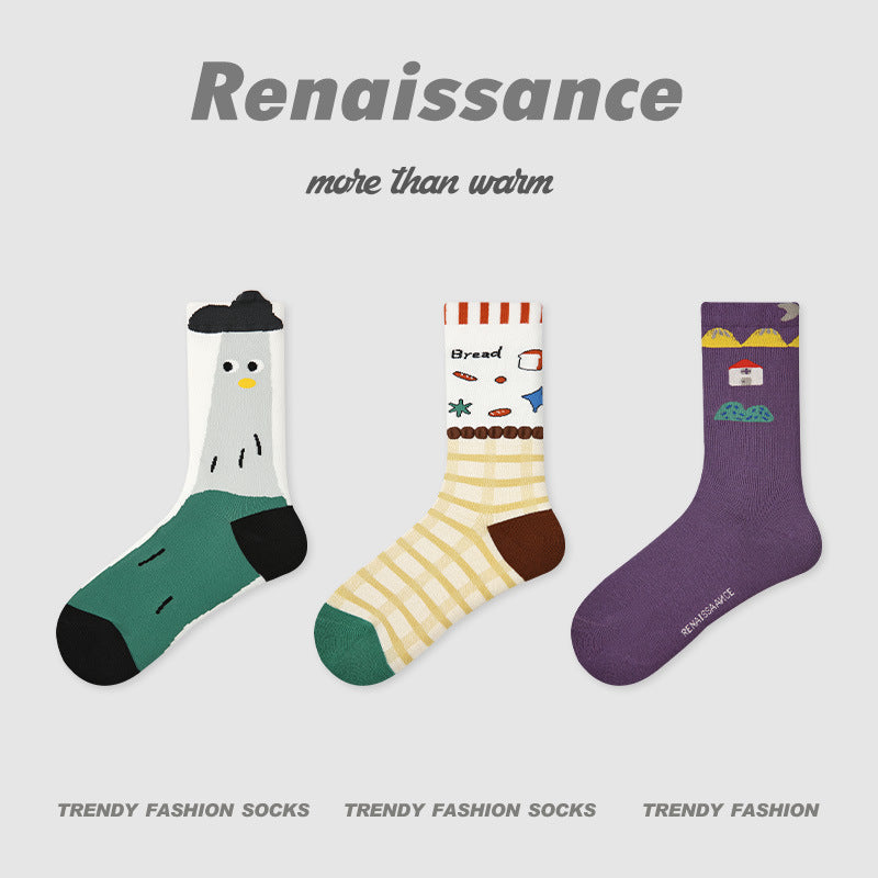 3-pack princess socks: green penguin, yellow bread stripes, and purple house with bib