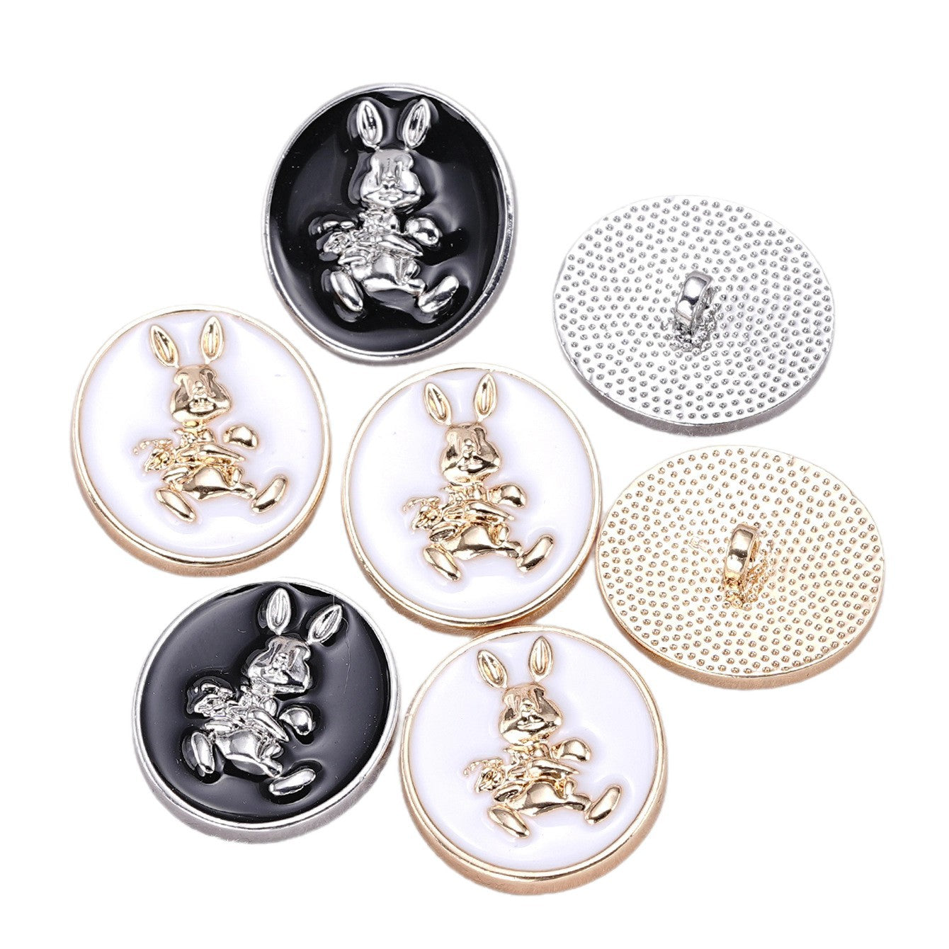 Set of rabbit oval shank buttons: white gold and black silver fronts, textured backs