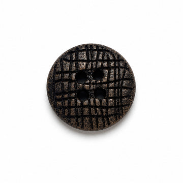 Dark brown flat round wood button with carved grid texture and four holes