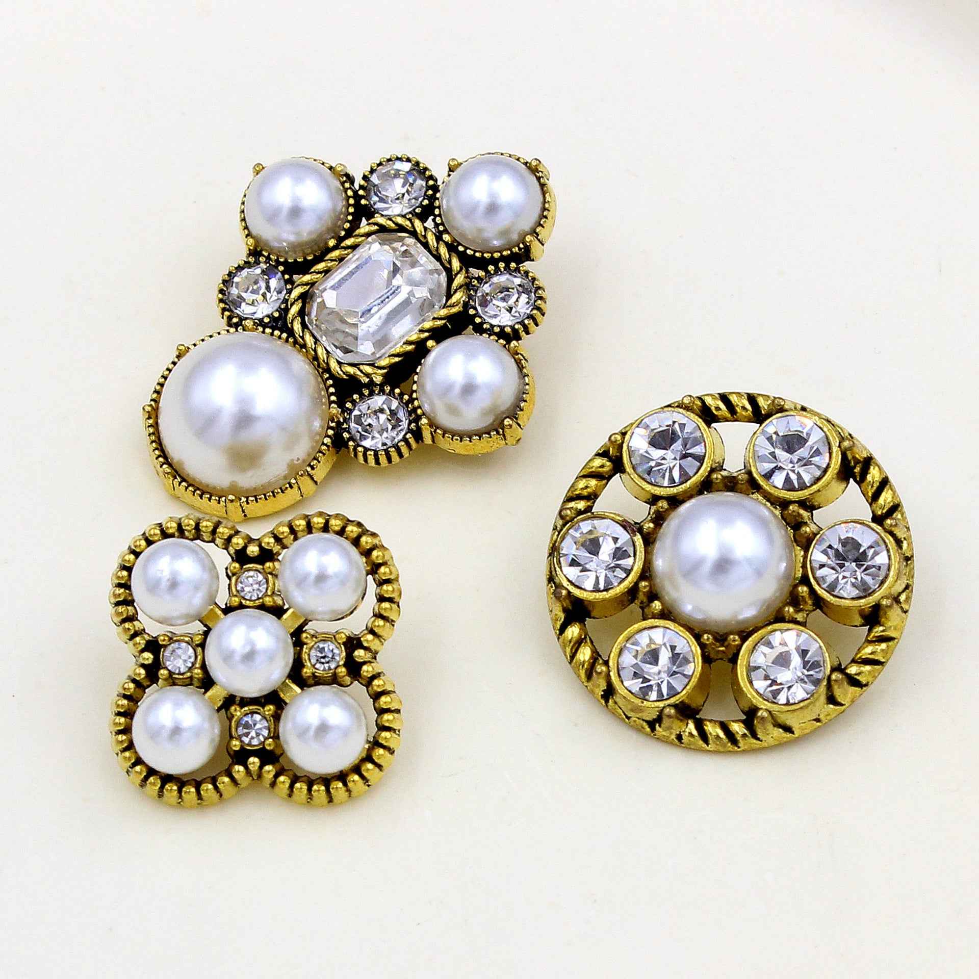 Gold baroque pearl & rhinestone buttons: oval and round motifs with crystals