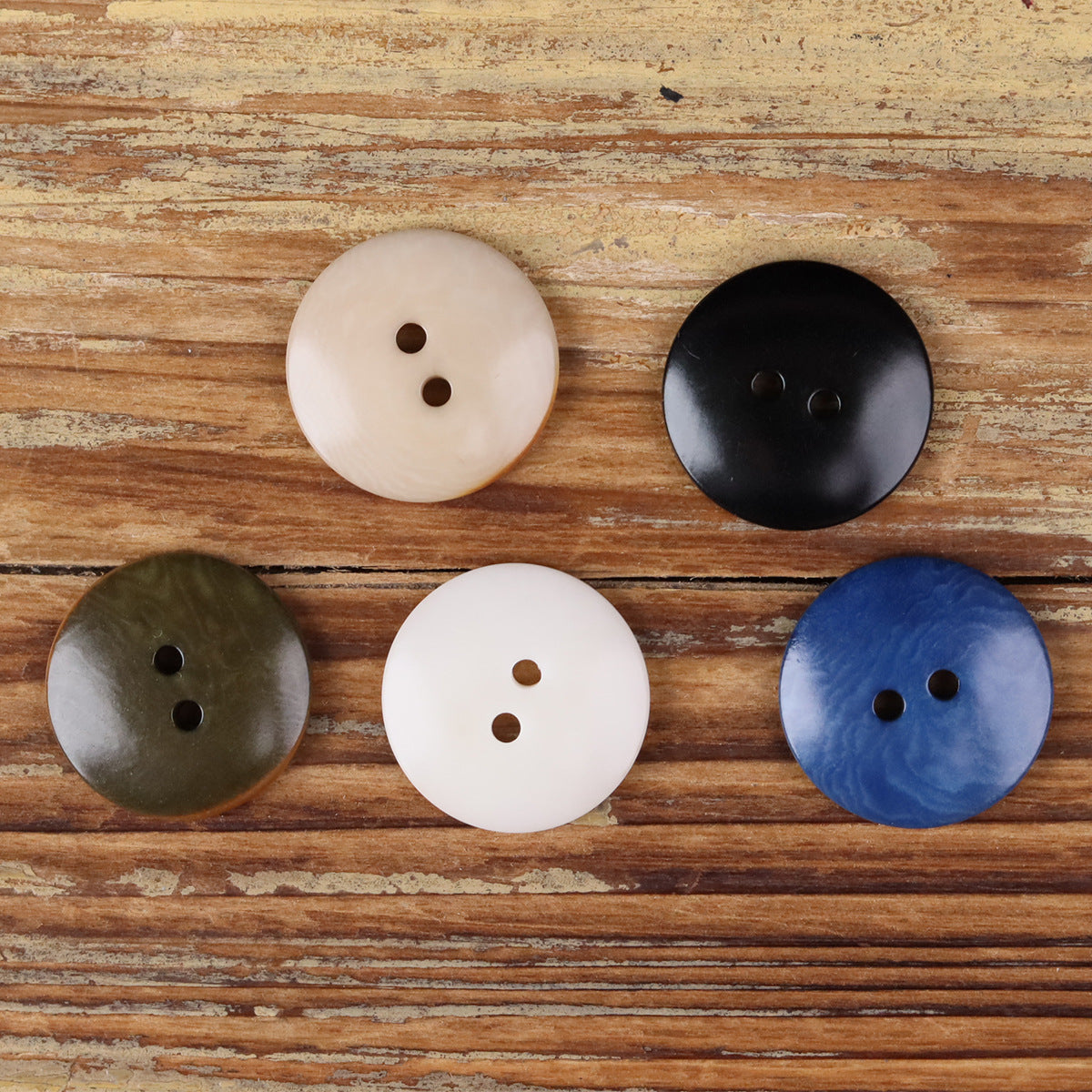 Natural round 2-hole buttons in beige and dark coffee shades, flat vintage style