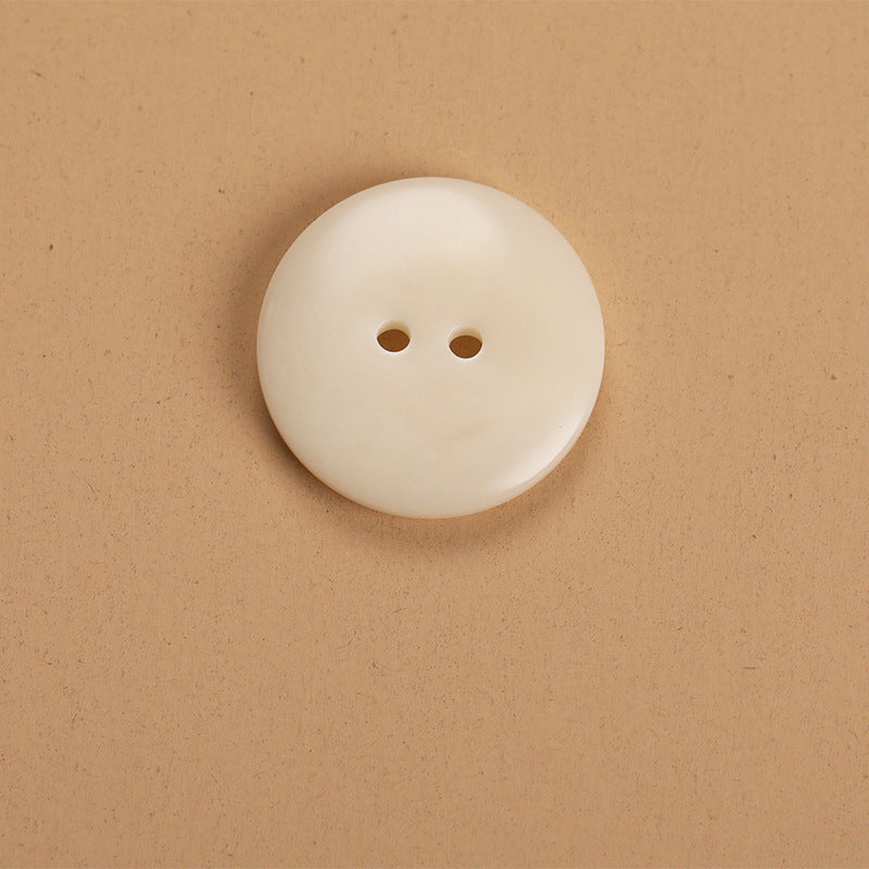 Natural round 2-hole button, front view