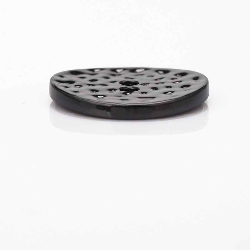 2-hole metal button, black stippled texture with two holes