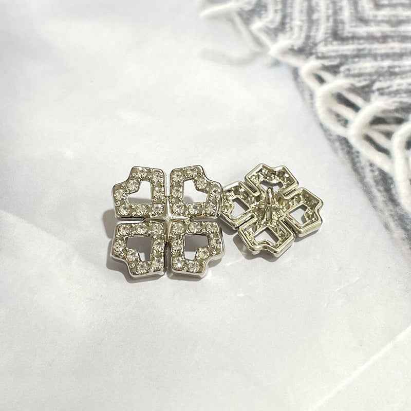 Four-Leaf Clover crystal metal shank buttons, silver tone, angled view