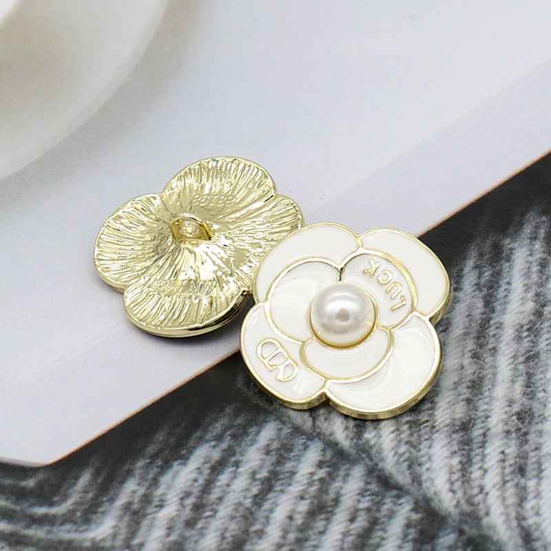 Pearl petal metal shank button, black enamel with gold edges and white center pearl