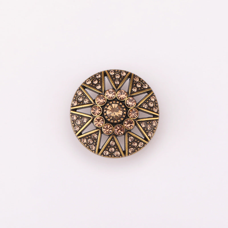 Hollow star crystal metal shank button, antique gold tone with rhinestone sunburst.