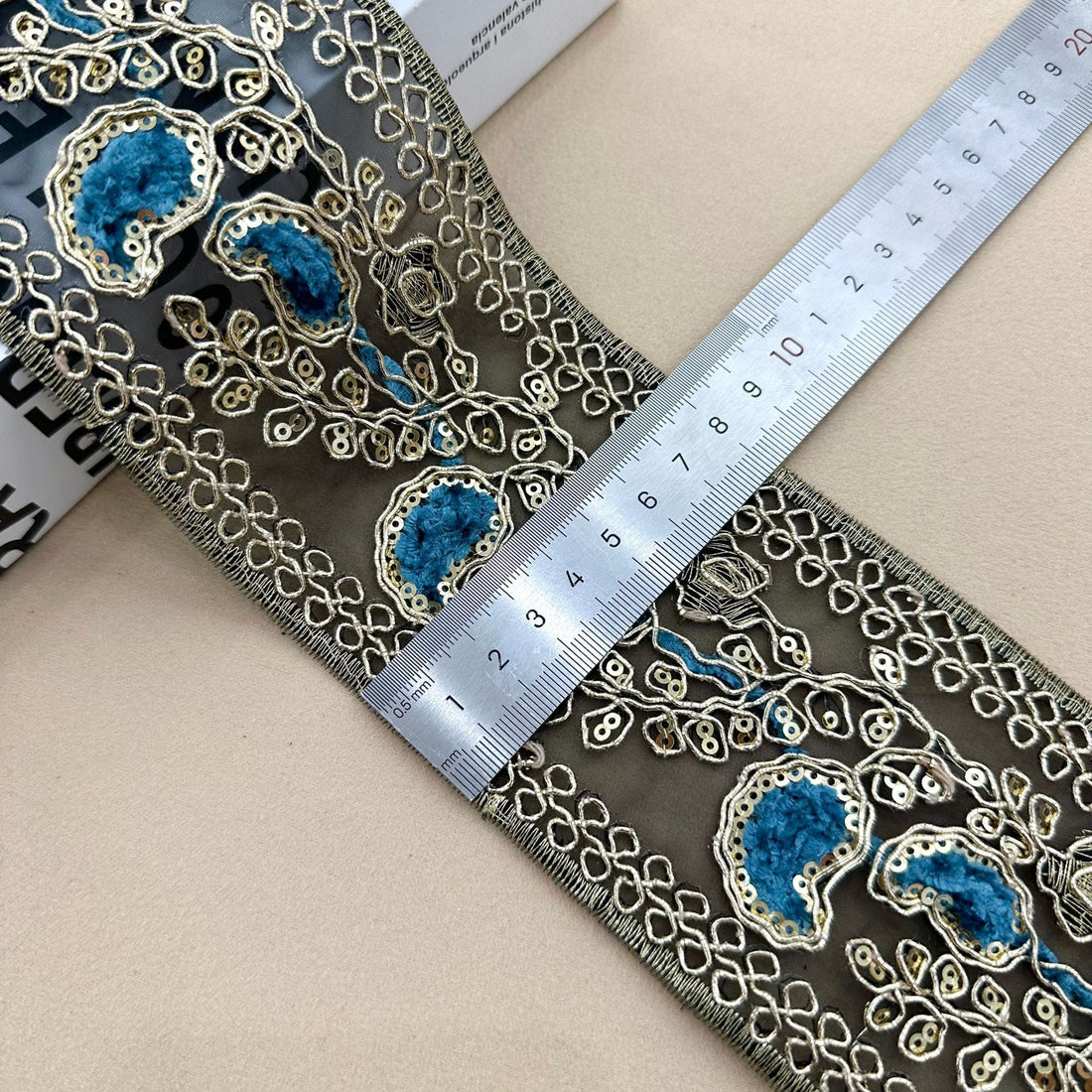 Navy sequin embroidered lace trim with ornate oval motifs, 8 cm wide