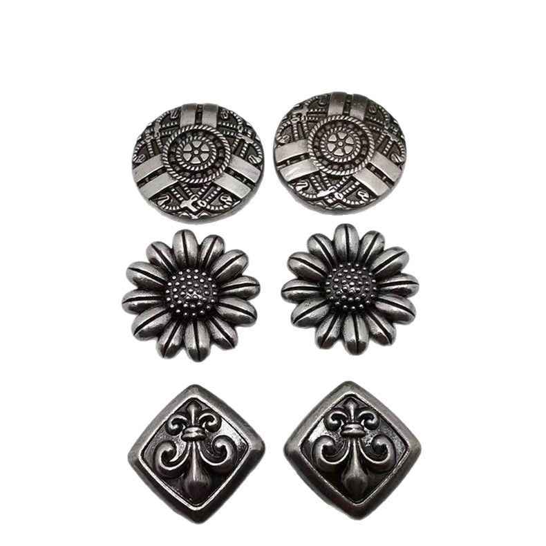 Antique silver-tone decorative rivet studs, floral and geometric motifs (6 shown)