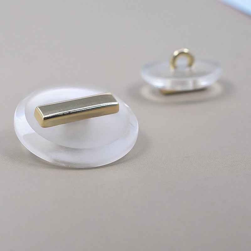 23/25mm transparent resin metal shank button with gold rectangular bar