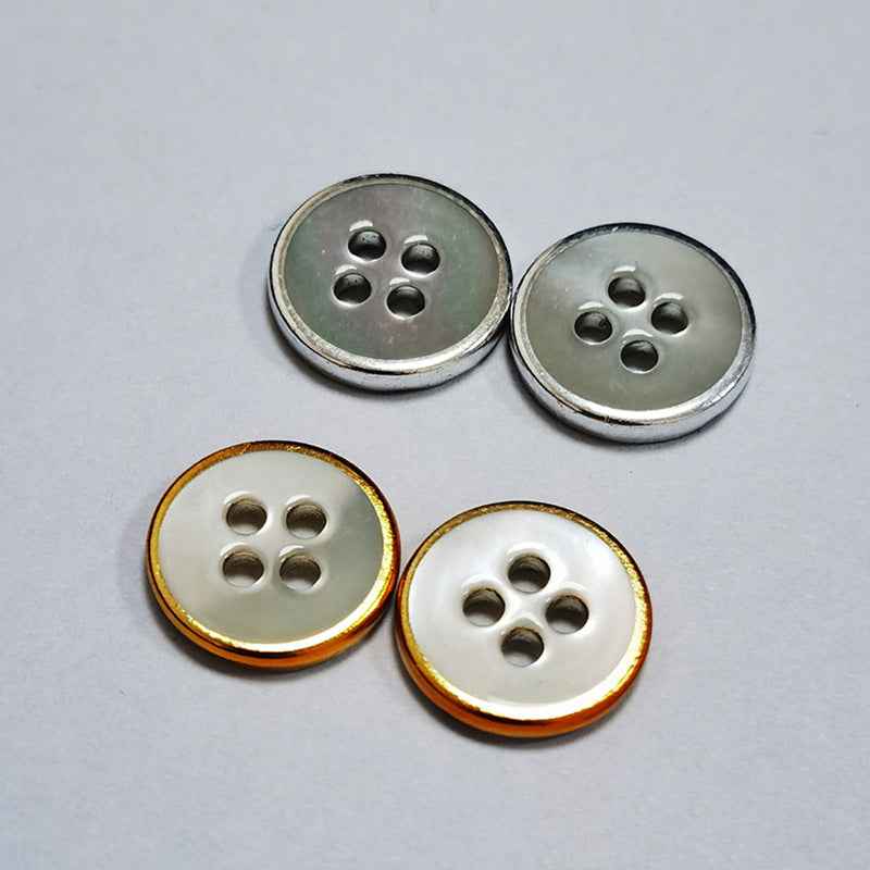 Round 2-hole shell buttons, silver-toned faces with gold/silver rim, 18L size