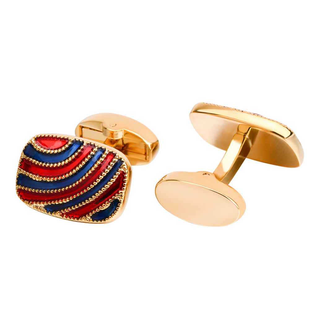 Gold oval cuff links with red and blue drip stripe enamel design