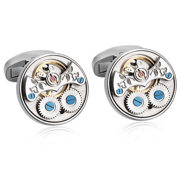 Manschettenknöpfe mit offenem Tourbillon-Uhrwerk, silberfarben, blaues Detail.
