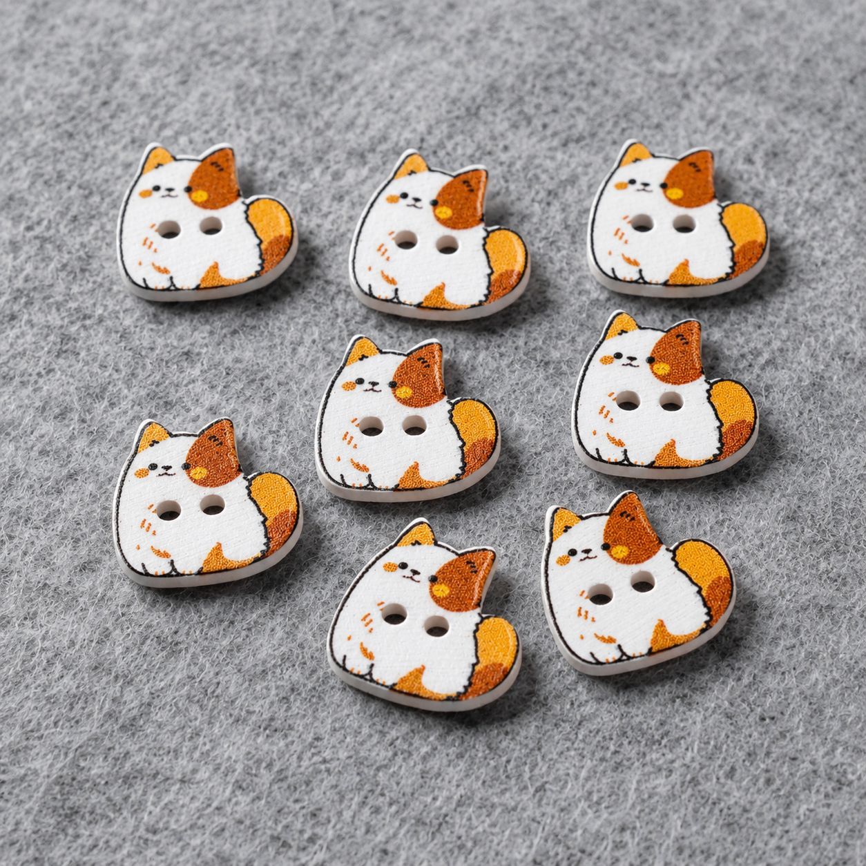 Set of mouse-shaped resin buttons in white with orange ears, two-hole design