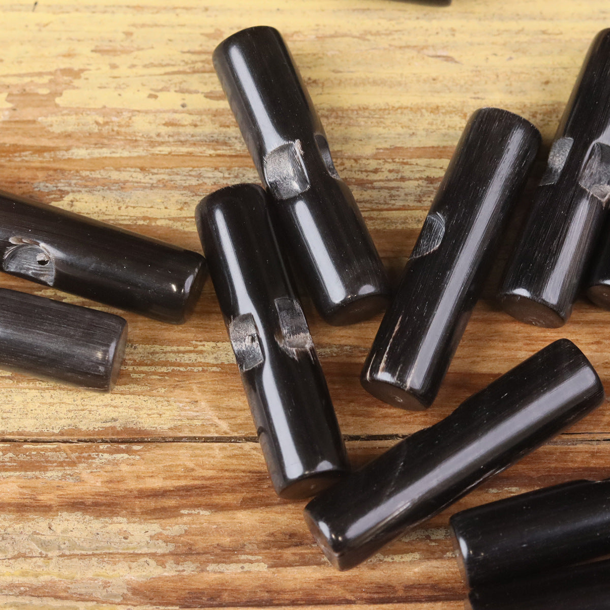 Natural horn toggle button bars, dark black bar shapes, multiple pieces
