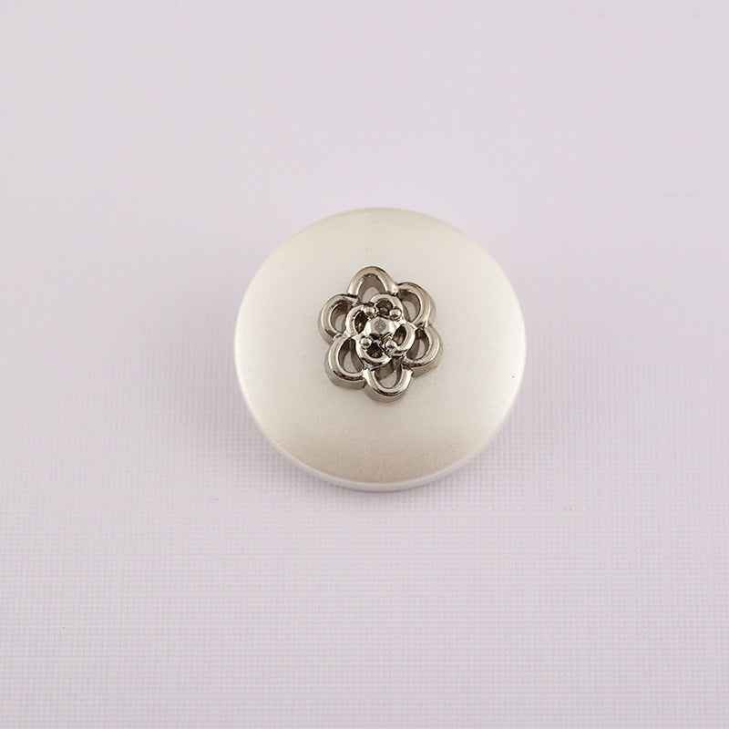 Pearl white round resin button with metal shank and silver decorative center