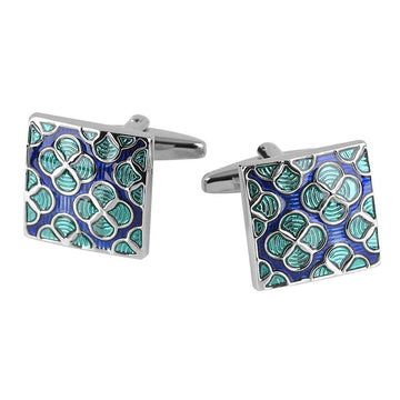 Square enamel cufflinks with blue background and green floral pattern, silver frame.