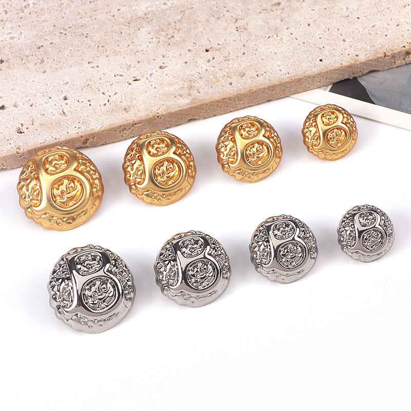 Gold domed letter B metal shank button, embossed ornamental crest