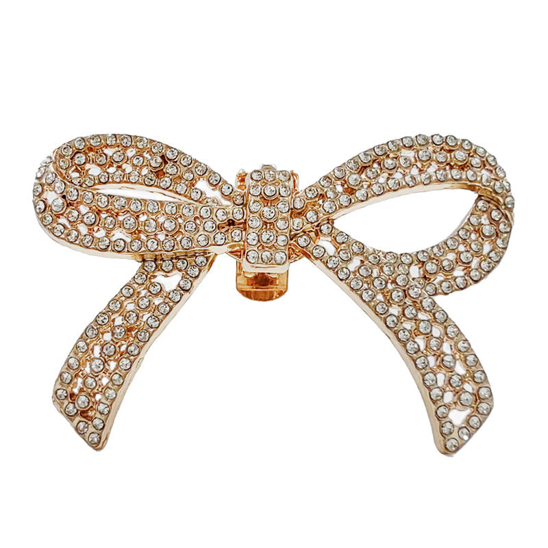 Gold-tone rhinestone bow detachable shoe clip, arched loop design with center clasp