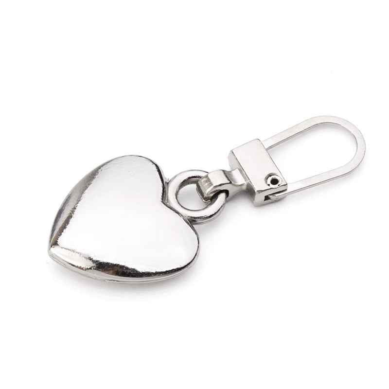 Silver heart zipper pull with metal loop and clip mechanism