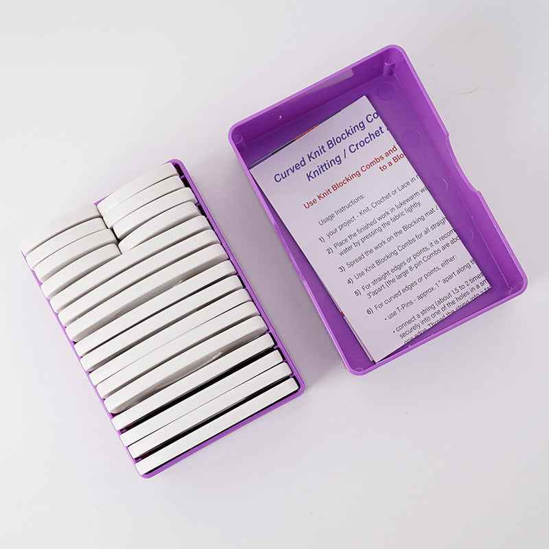 Knit blocking combs set with white pins and purple storage tray