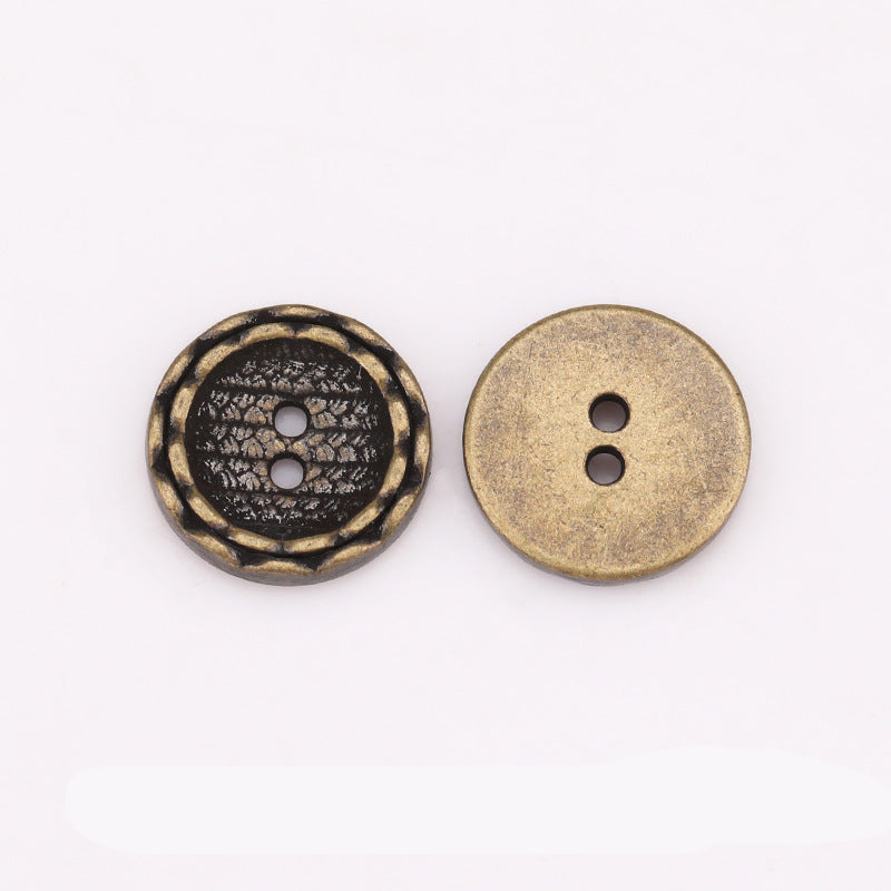 Schwarzer Metallknopf mit Spitzenrand, rund, 2 Löcher; goldfarbene Rückseite