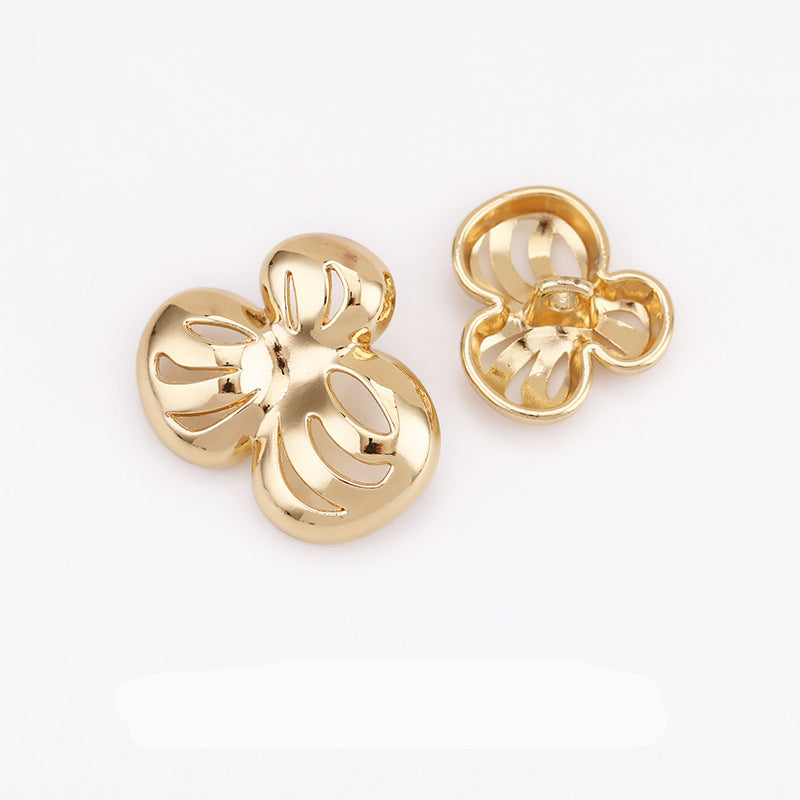 Gold-tone hollow flower metal shank buttons, two-piece view with loop details