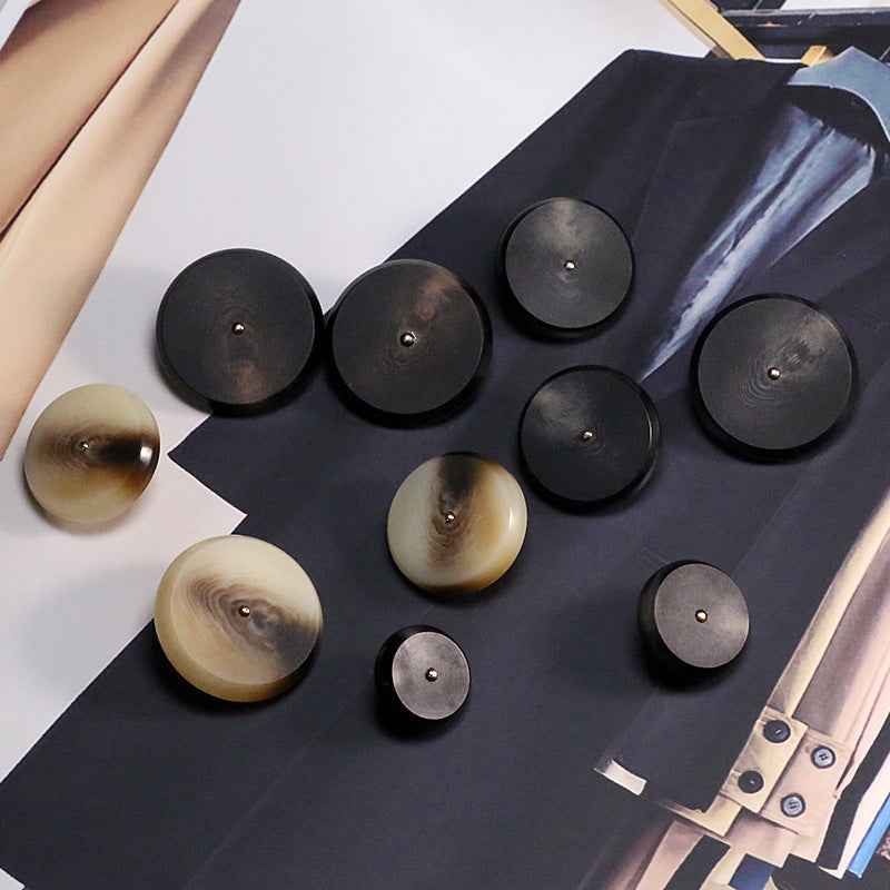Mixed set of round resin buttons in black and khaki with metal shanks