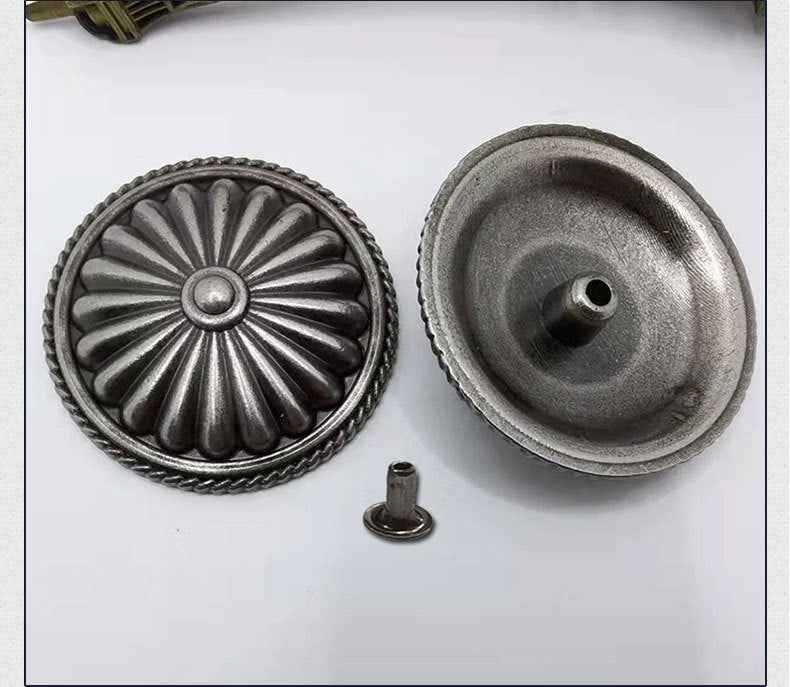 Round antique metal rivet, front floral shell pattern and reverse with mounting post