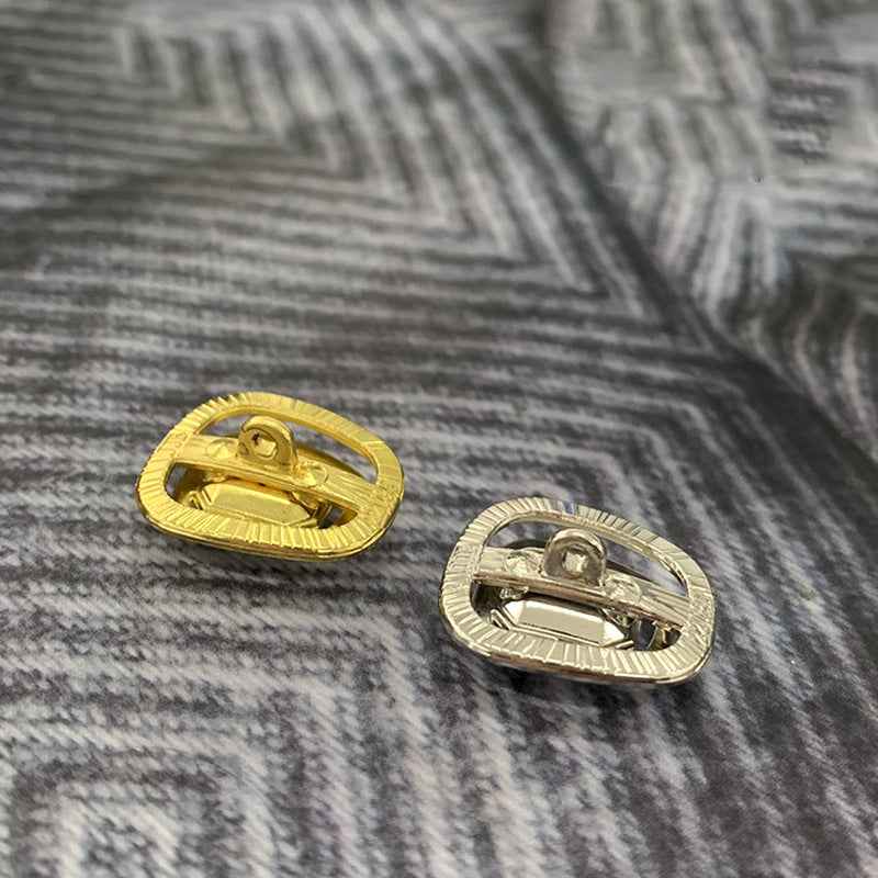 Gemstone shank button backs, gold and silver bases with bar pin, close-up pair