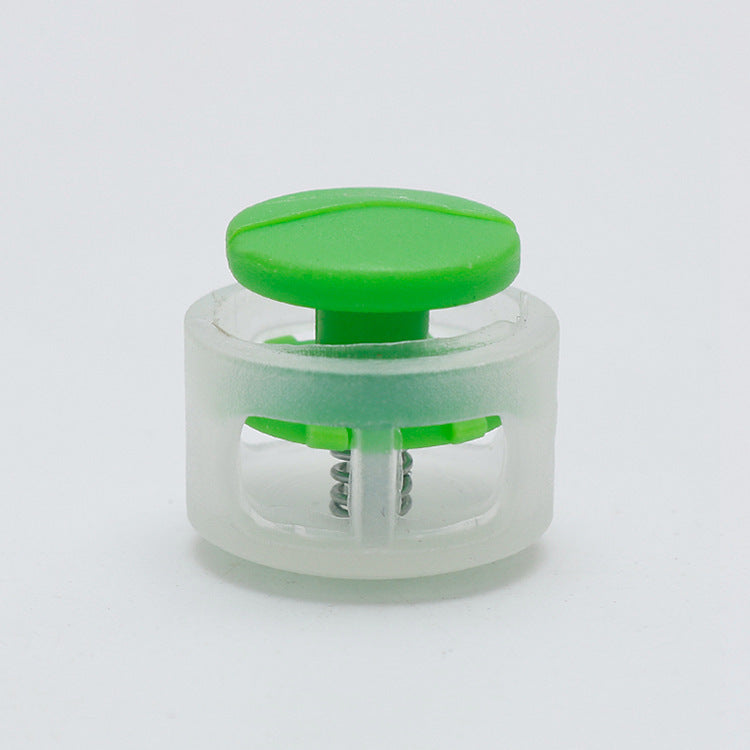 Green 17mm plastic cord lock toggle with spring stopper, clear base